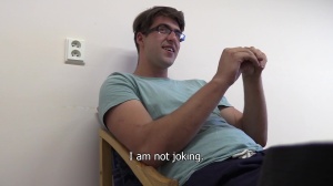 A boy becomes a fake penis for cash