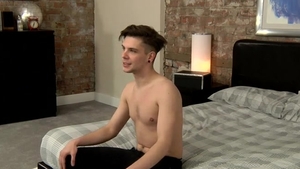 BlakeMason.com - Twink boy jerking uncut cock in the bed